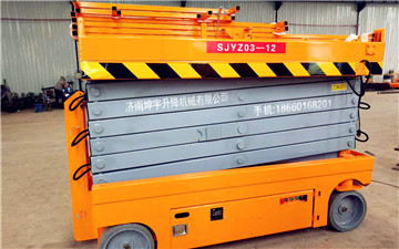 江蘇儀化設(shè)備工程有限公司采購(gòu)鑫坤宇自動(dòng)升降平臺(tái)12米